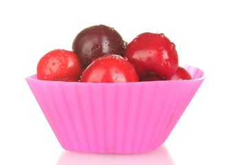 Cherry in the mold of silicone isolated on white close-up
