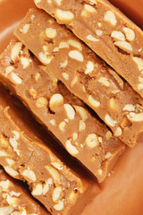 Cut sherbet with nuts in the plate close-up