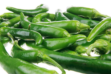 pile of spicy green hot chili peppers