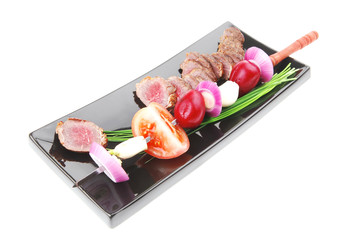 meat food : roast red meat slices served on black plate