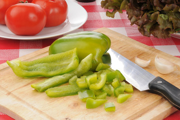 Diced green peppers with tomatoes