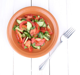 Fresh salad with tomatoes and cucumbers