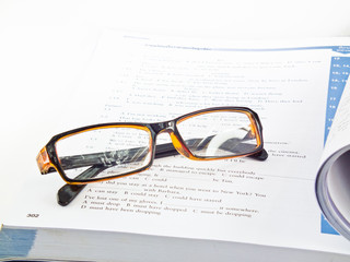 glasses on book