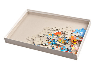 Paper jigsaw puzle in box isolated