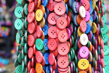 Artisan souvenir buttons of different colors