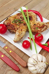 garnished roasted chicken legs