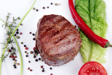 beef fillet pieces on wood