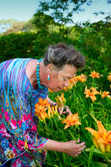 old woman in garden