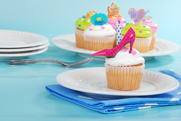 decorated cupcakes on a plate