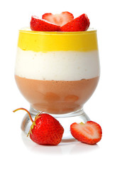 colored jelly in a glass with strawberry