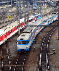 Two passing trains near railway station