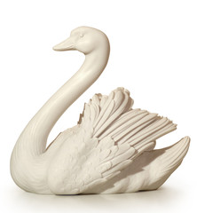 a statue of marble depicting a swan