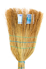 Broom sweep the euro close-up