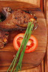 savory plate on wood : grilled ribs on plate