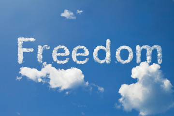 Fototapeta premium freedom cloud word on blue sky