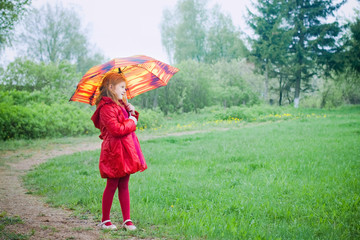little girl with  umbrella