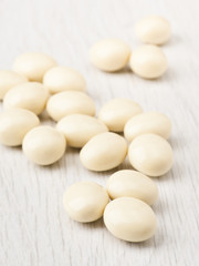 white chocolate balls with almond heart