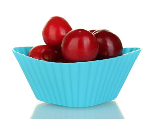 Cherry in the mold of silicone isolated on white close-up
