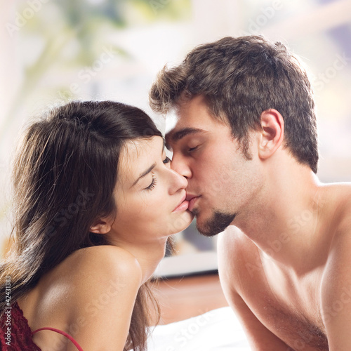 Couple making love in bed