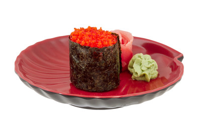 Sushi with fying fish caviar isolated over white background