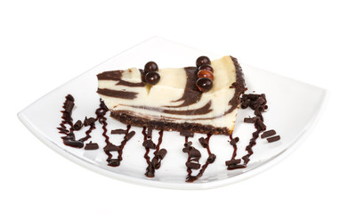 cheesecake with chocolate sauce.