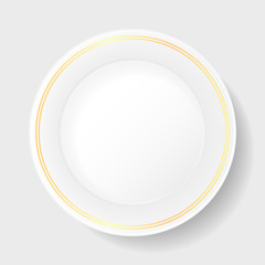 white porcelain plate with gold patterned in strips along the ed
