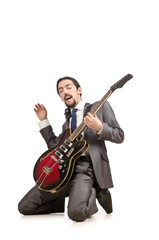 Young guitar player isolated on white