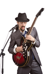 Fototapeta premium Businessman playing the guitar on white