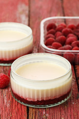 Lemon possets with raspberries