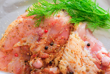 Raw chicken, marinated in spices