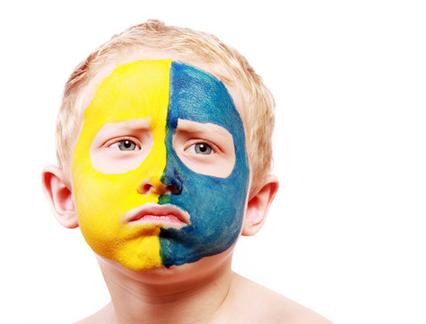 Portrait of disappointed little ukrainian fan