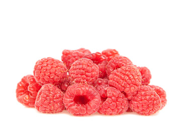 Fresh Raspberries Closeup on a white background.