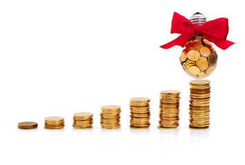 Traditional glass bulb with many golden coins