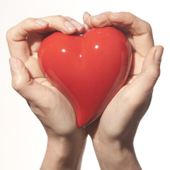 Obraz premium Women Hands holding a heart