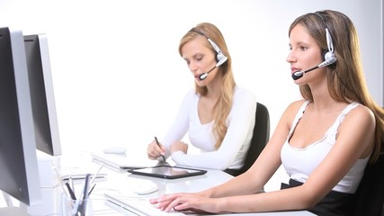 office workers,smiling secretaries ,computer,headphones,tablet