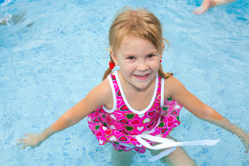 little girl in the pool