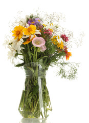 beautiful bouquet of bright  wildflowers in glass vase, isolated