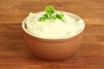 Mashed potato with parsley in the bowl