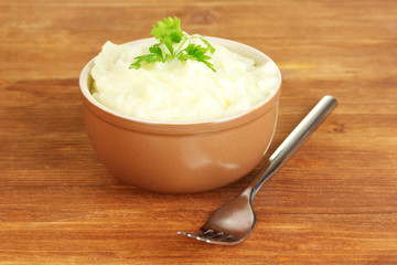Mashed potato with parsley in the bowl