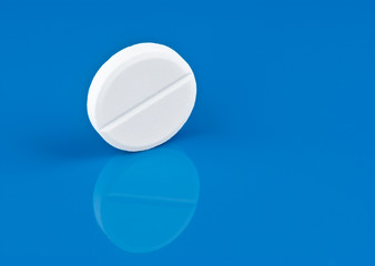 Pill on blue background