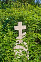 old stone monument on a grave
