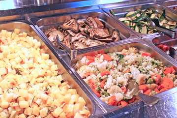 steel trays filled with great food in a Italian restaurant