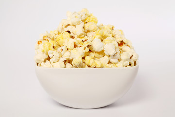 Bowl of popcorn isolated on white background