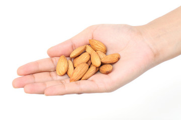 Handful of almonds against white background