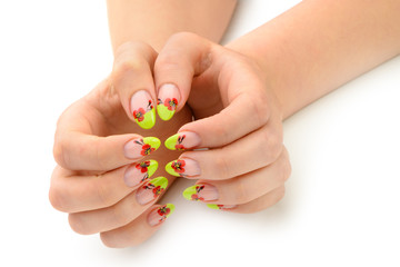 Female hands with manicure closeup. Isolated on white