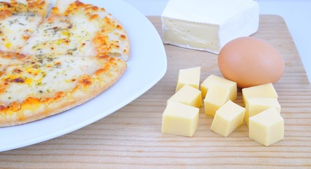 Pizza, cheese and egg.