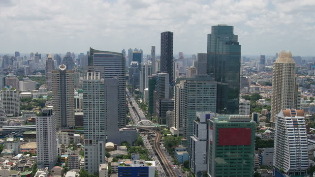 Bangkok Skyscrapers Time Lapse with Car and Train Traffic