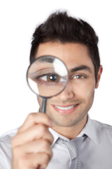 Businessman Holding Magnifying Glass