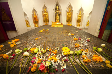 Group of standing  buddhas at pagoda in Thai temple.