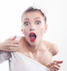 Excited shouting young pretty woman isolated on white background